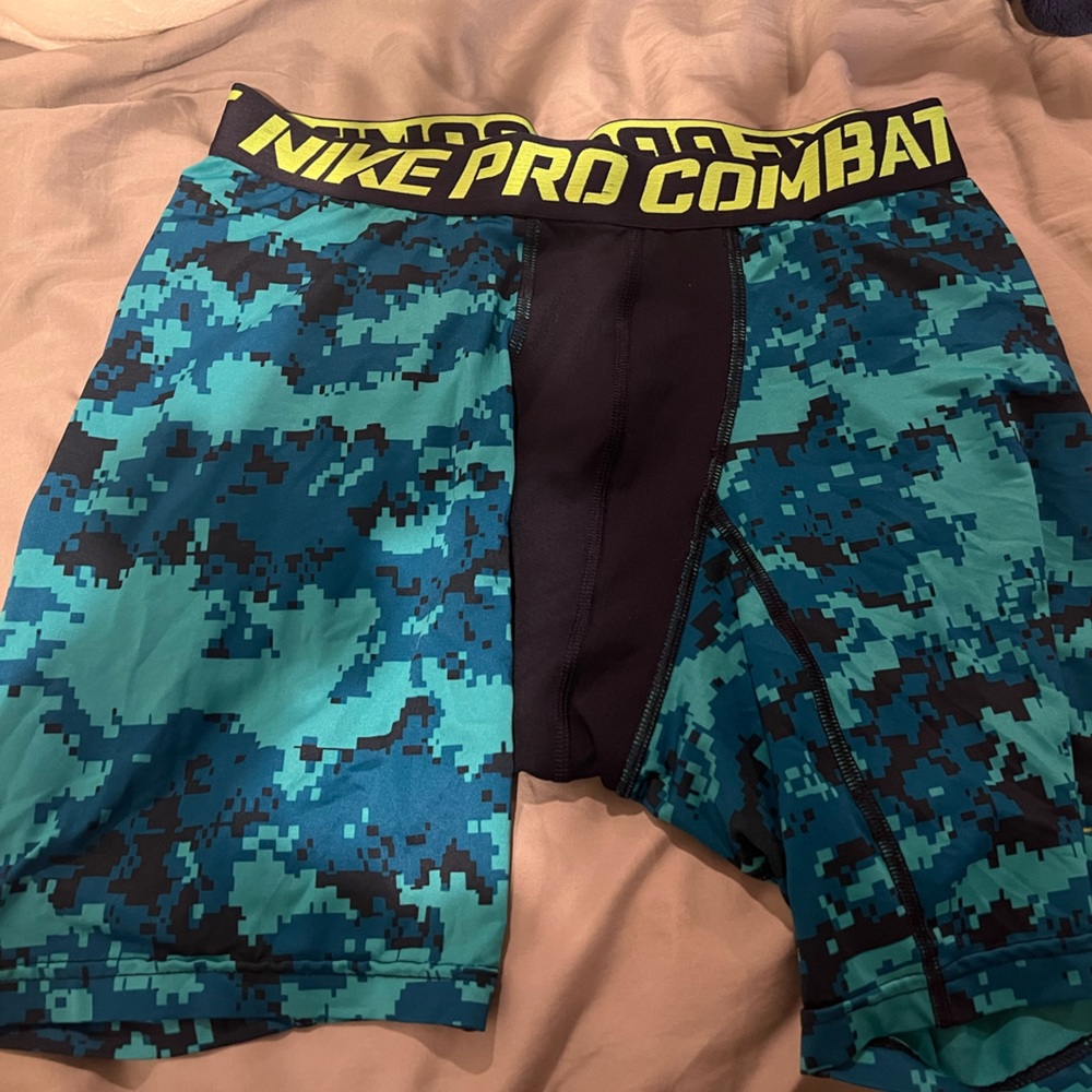 Men’s Blue and Black Nike Pro Combat compression shorts